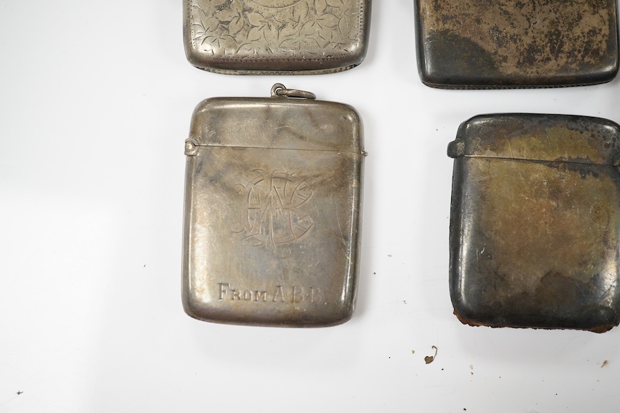 Five assorted late 19th/early 20th century silver vesta cases, largest 58mm. Condition - poor to fair